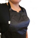 Black apron lifestyle no background